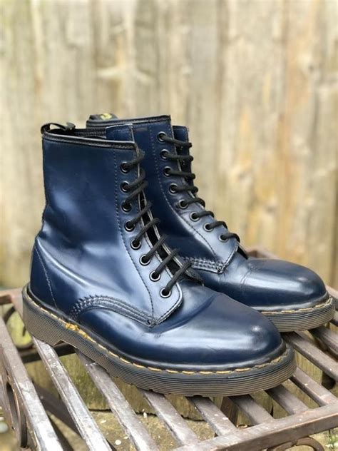 navy blue doc marten boots.